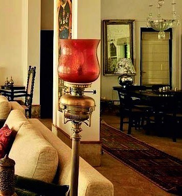 Brass and glass table lamp in a villa living room